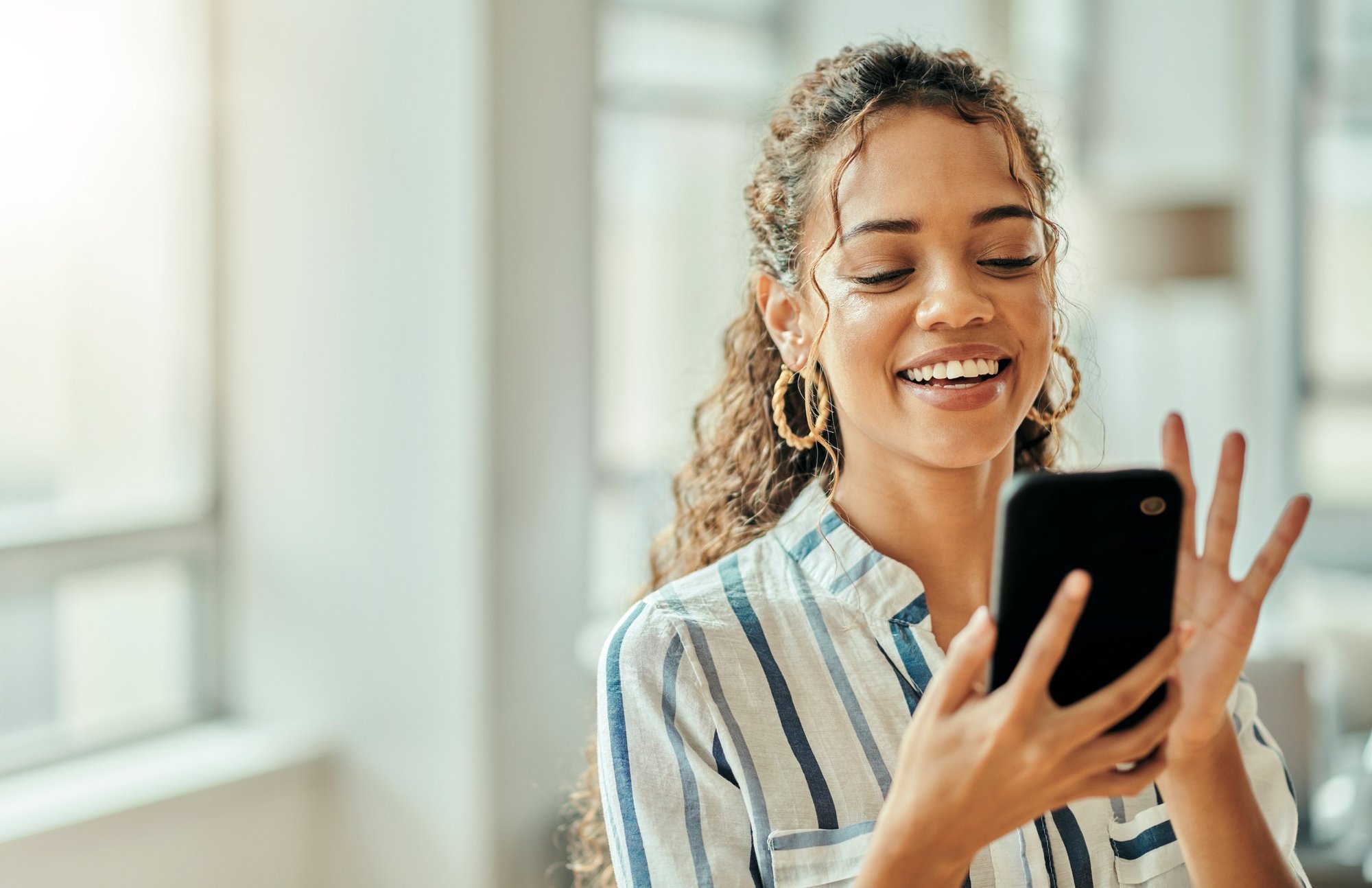 A woman looks at software translated into her language of choice
