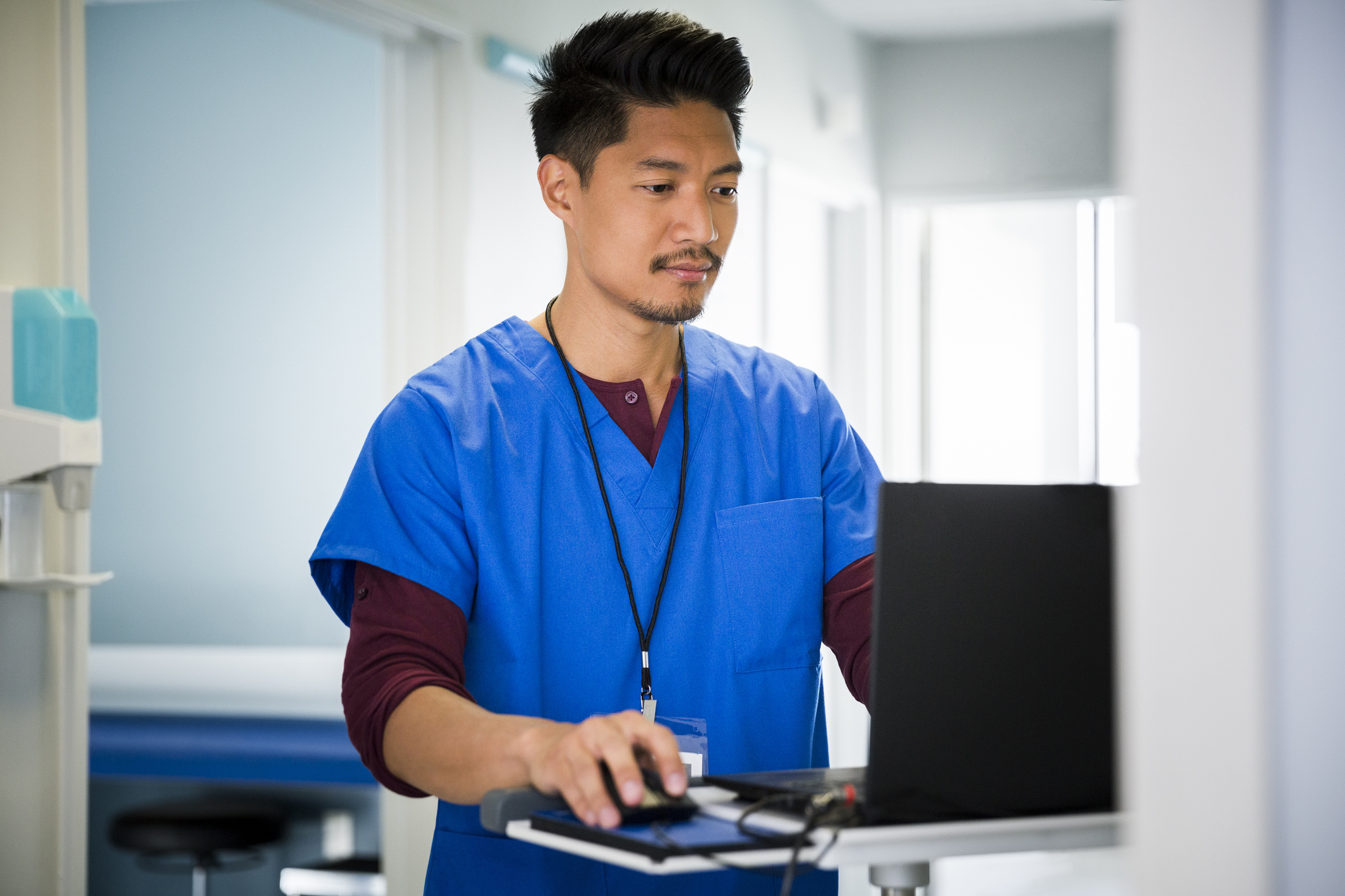 A healthcare worker accesses an interpreter through the EHR system.