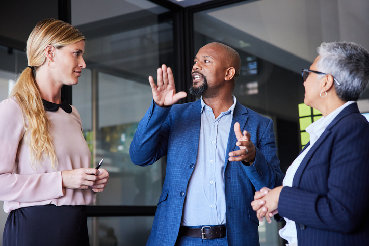 A professional interpreter provides support in a business meeting