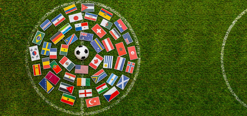 A visual of a soccer ball surrounded by flags