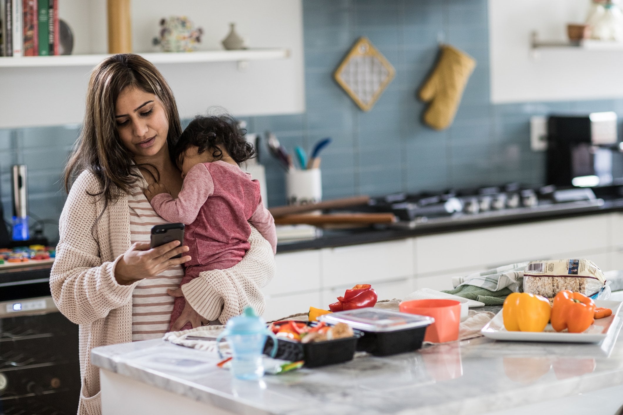 A mother calls a business that has interpreting support