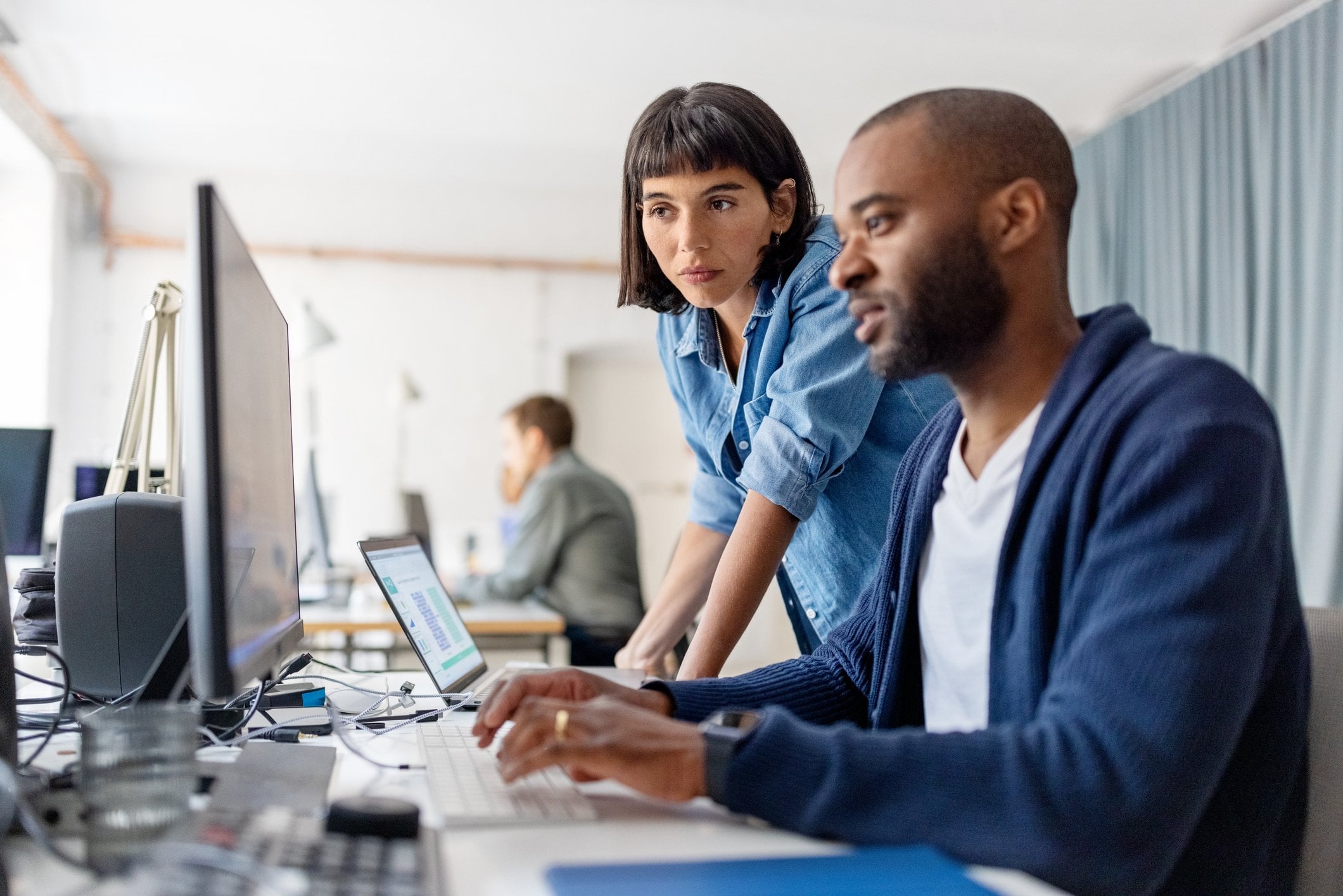 Two people discuss what type of simplification would work best for their needs.