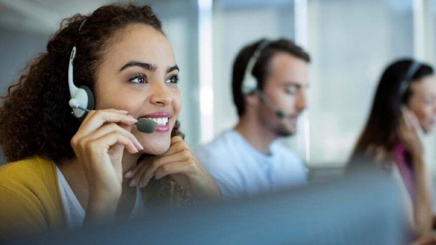A call centre agent finishes a call efficiently with the help of an interpreter