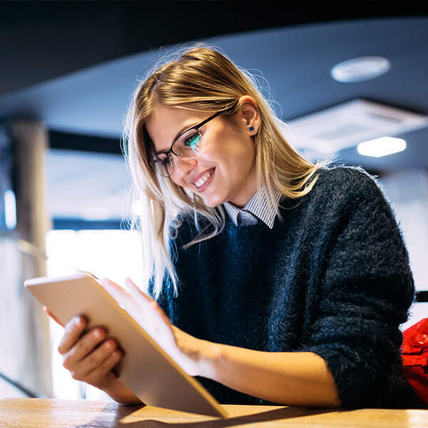 A client reviews a translation on a tablet
