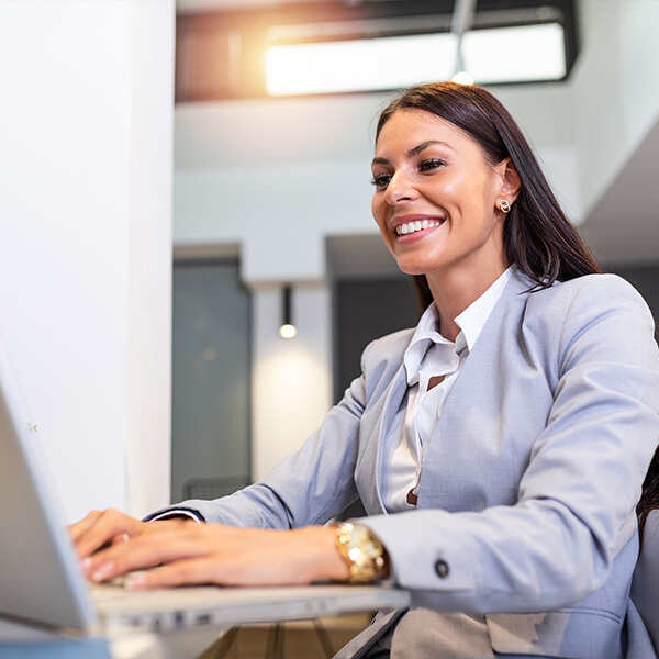 A woman is happy to find the content of a website has been localised.